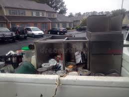 Best Construction Debris Removal  in Tuscola, IL